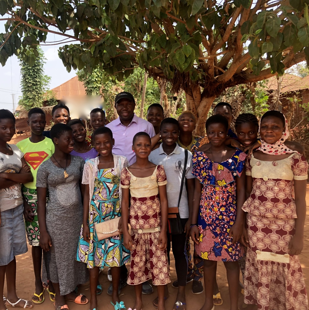 Peter with some of the girls he supports in Benin Republic